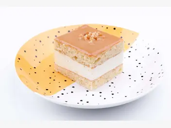 Ilustracja przepisu na: ciasto krówka z bitą śmietaną