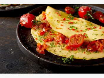Ilustracja przepisu na: omlet z pomidorami i cebulą