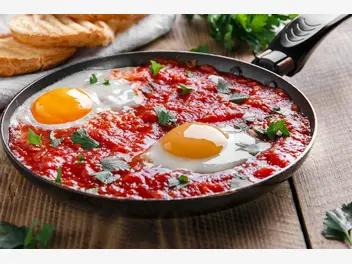 Ilustracja przepisu na: jajka z pomidorami