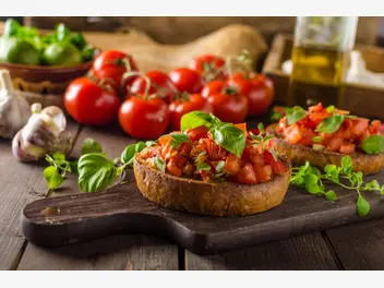 Ilustracja przepisu na: bruschetta z pomidorami i mozzarellą