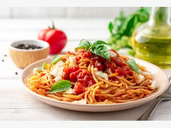 Ilustracja przepisu na: spaghetti z pomidorami z puszki